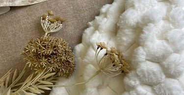 Creating a Calm, Cozy Space with Cream Wallpaper & Warm-Tone Textures