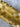 COSMOLiving - Graphic Groove Gold Wallpaper