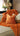 Paul Moneypenny Necking Orange Cushion