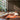 Metropolitan Stories Stitched Copper & Navy Wallpaper