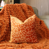 Paul Moneypenny Necking Orange Cushion