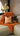 Paul Moneypenny Tall Orange Cushion