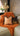 Paul Moneypenny Tall Orange Cushion