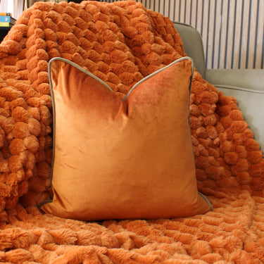 Paul Moneypenny Two Face Orange and Chocolate Cushion